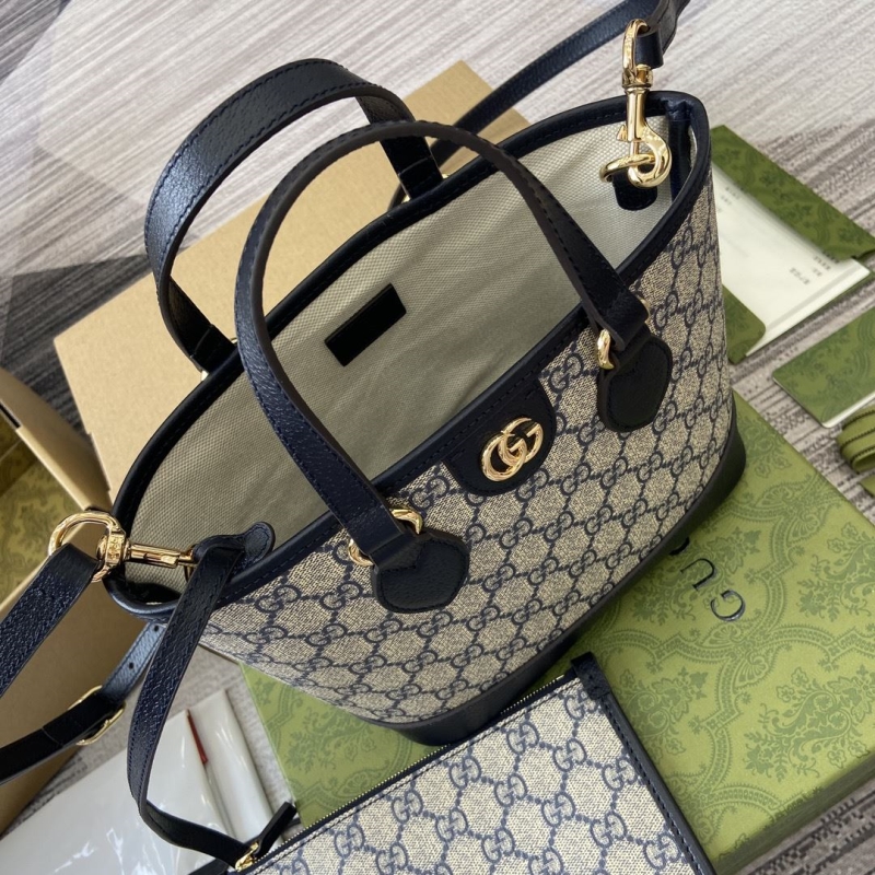 G*u*i shopping bags